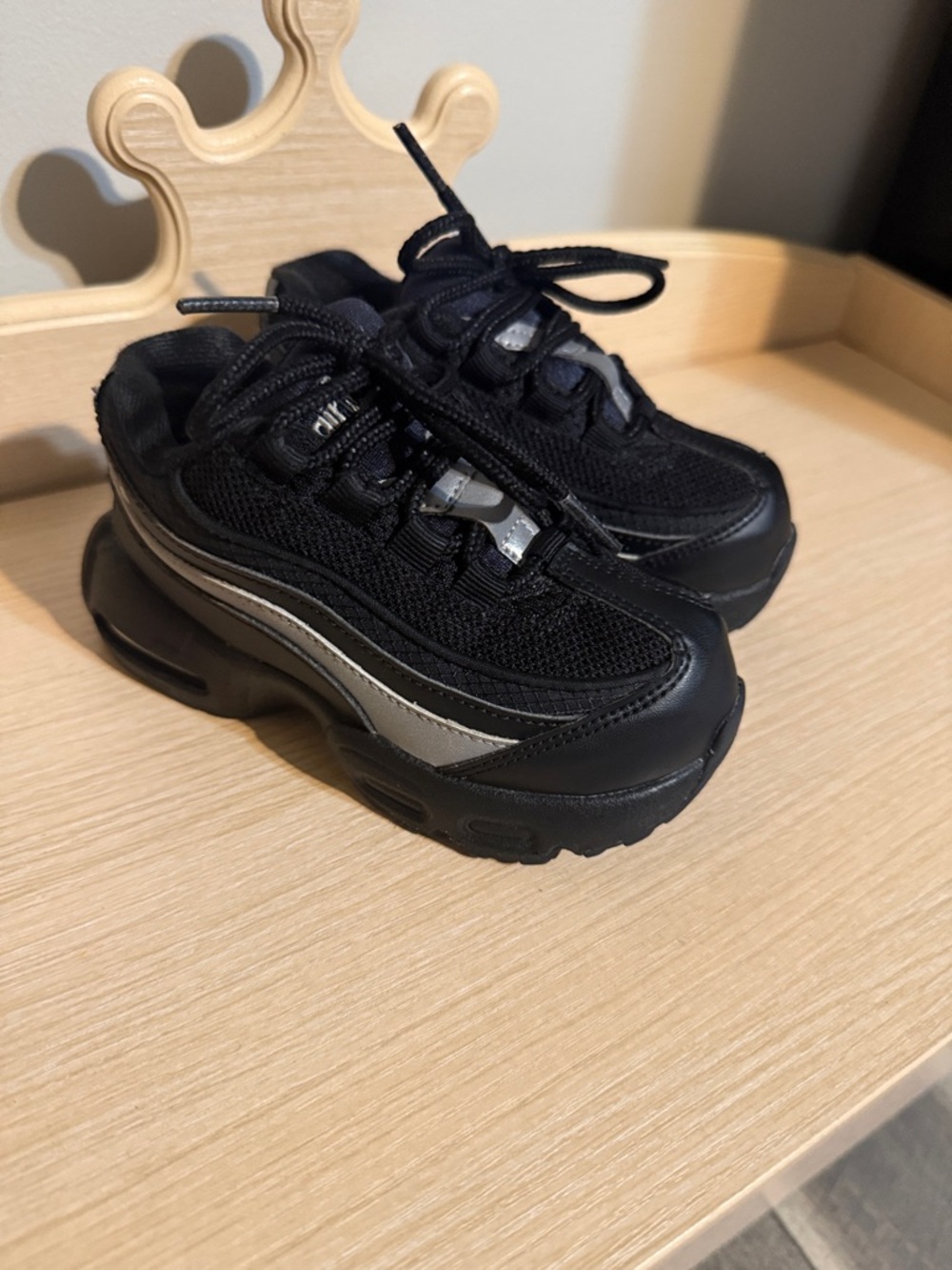 Nike Kids Black Sneakers with Silver Stripe